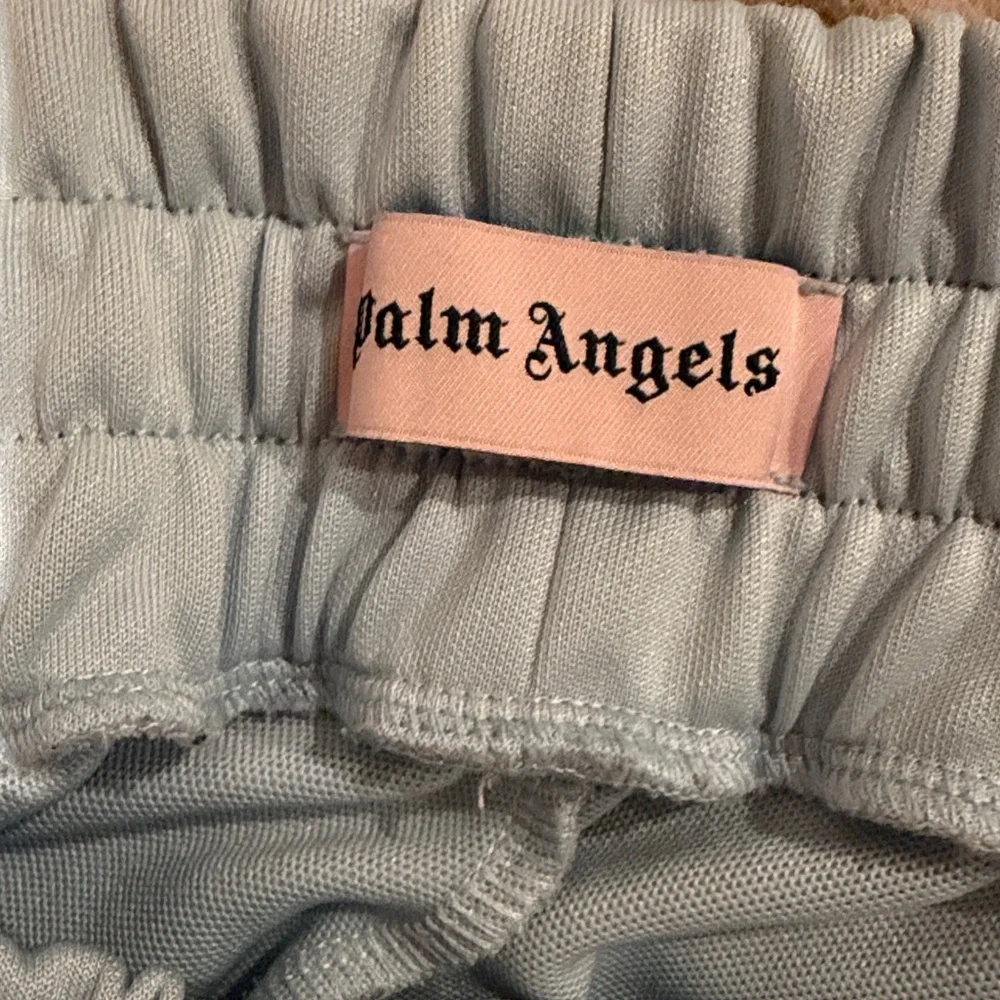 Palm Angels mens Sky Blue Joggers with White Stripes